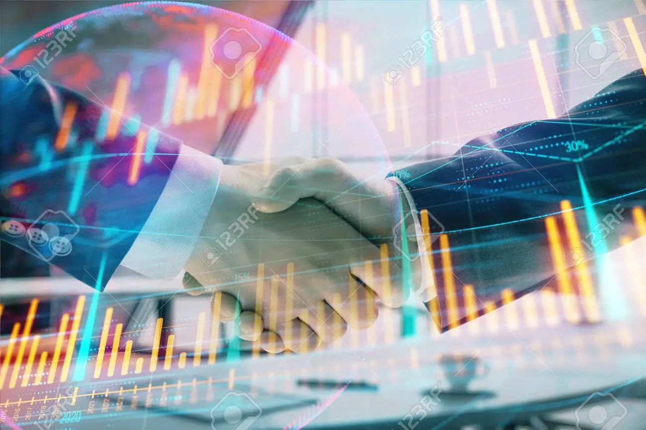 Multi exposure of financial chart and map on office background with two businessmen handshake. Concept of success in business